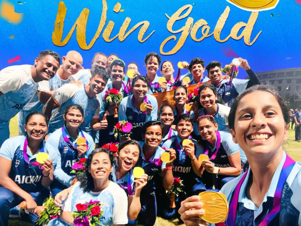 Winner of Asian Games 2023 Women's Cricket Final, Indian Women's Cricket Team posing with gold medal.